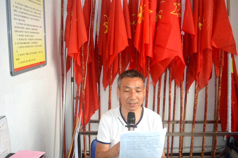 4综治办副主任任永忠发言.JPG